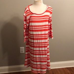 Orange and white long sleeve dress.